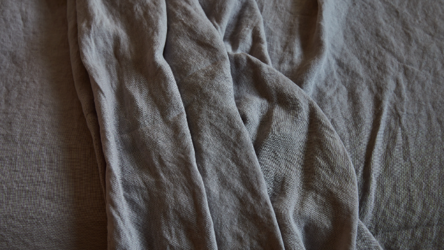 luxurious bedroom with stonewashed linen bedding