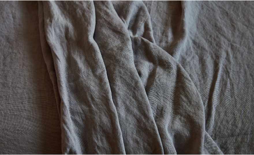 luxurious bedroom with stonewashed linen bedding