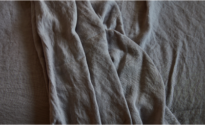 luxurious bedroom with stonewashed linen bedding