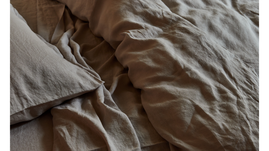 style a bedroom with stonewashed linen bedding 