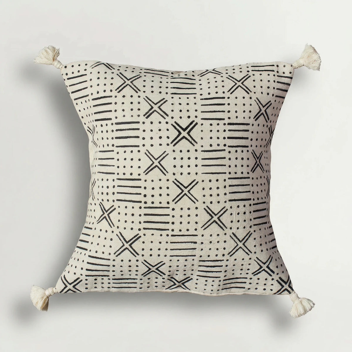Decorative pillow with black geometric pattern on a light gray background