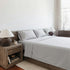 Cannoli Cream sheet set bedroom lifestyle — GOTS-certified organic cotton percale