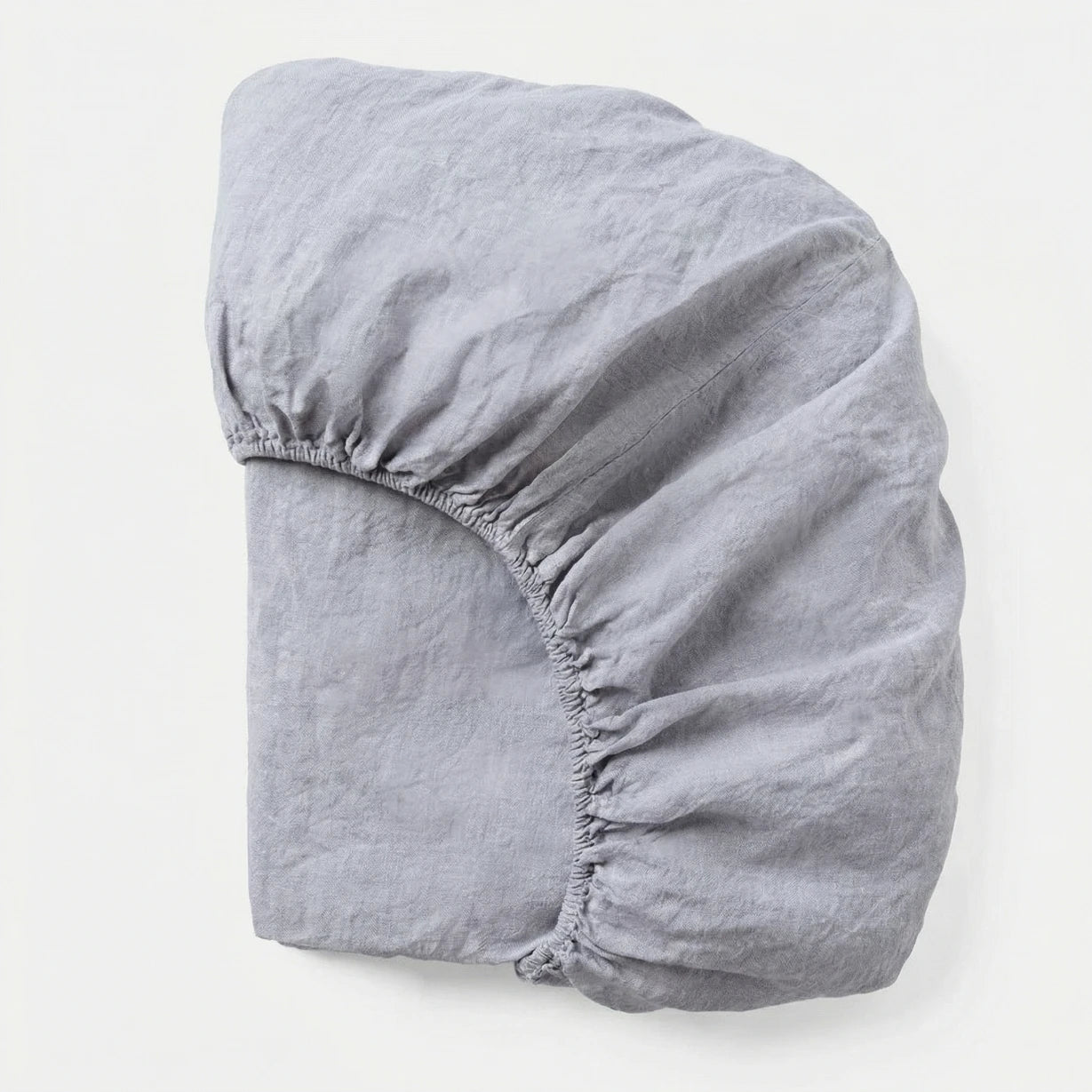 Gray fitted sheet on a white background